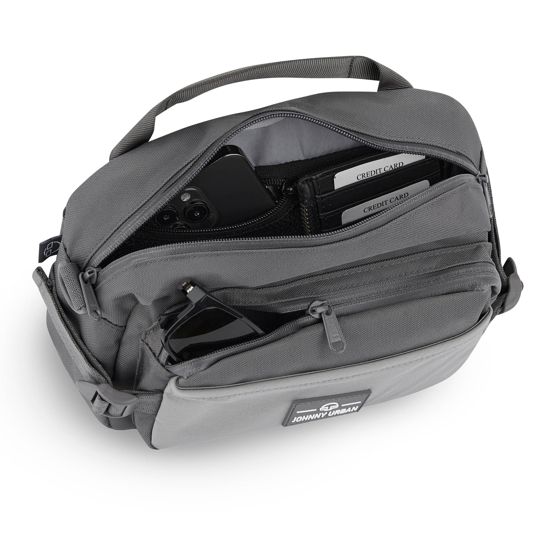 Große graue Bauchtasche 'Travis' von Johnny Urban mit offenem Hauptfach, sichtbaren Kreditkartenfächern und Sonnenbrille in der Fronttasche