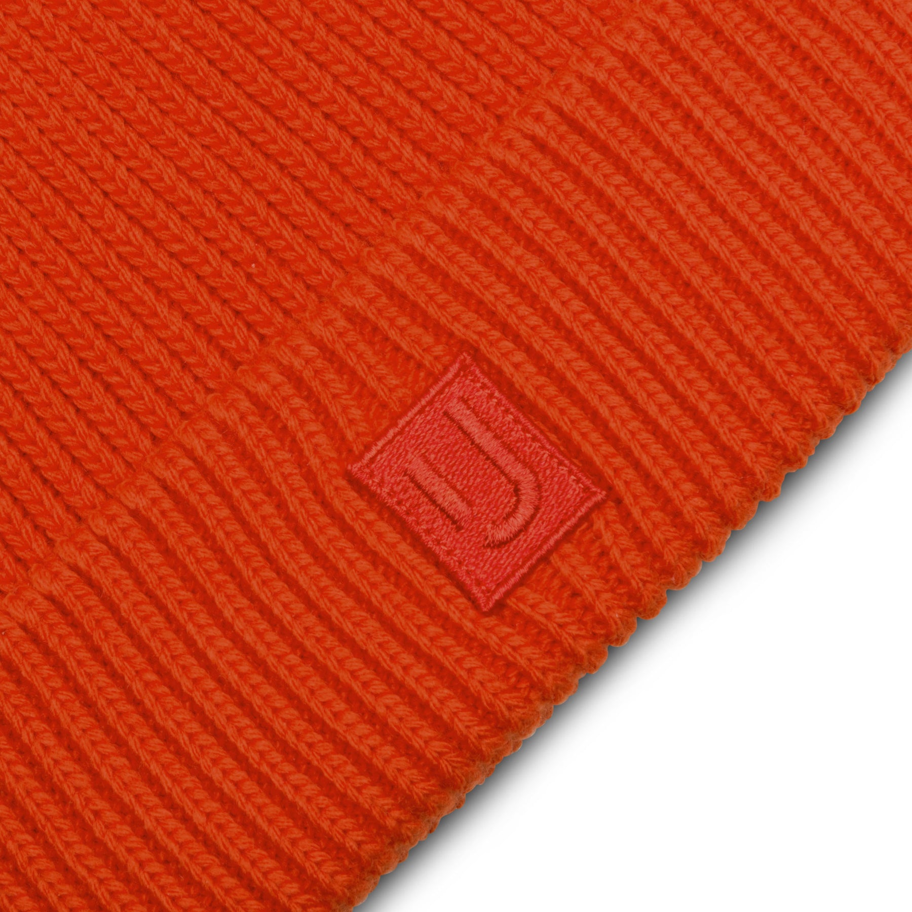 Korallrote gerippte Strickmütze 'Billie' mit Johnny Urban Logo-Patch