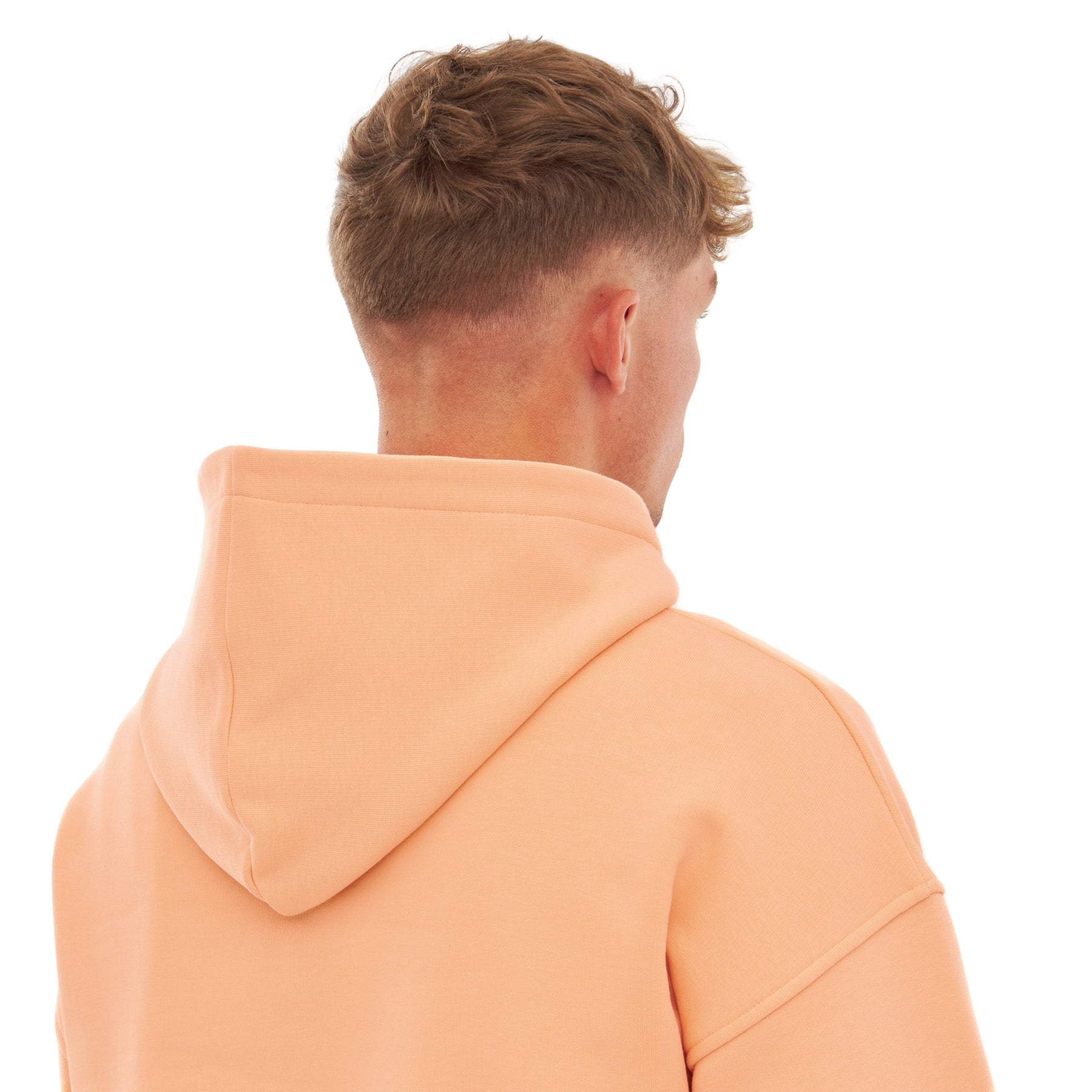 Überdimensionaler Herren-Kapuzenpullover 'Cody' in Pfirsich, Rückansicht mit Kapuze