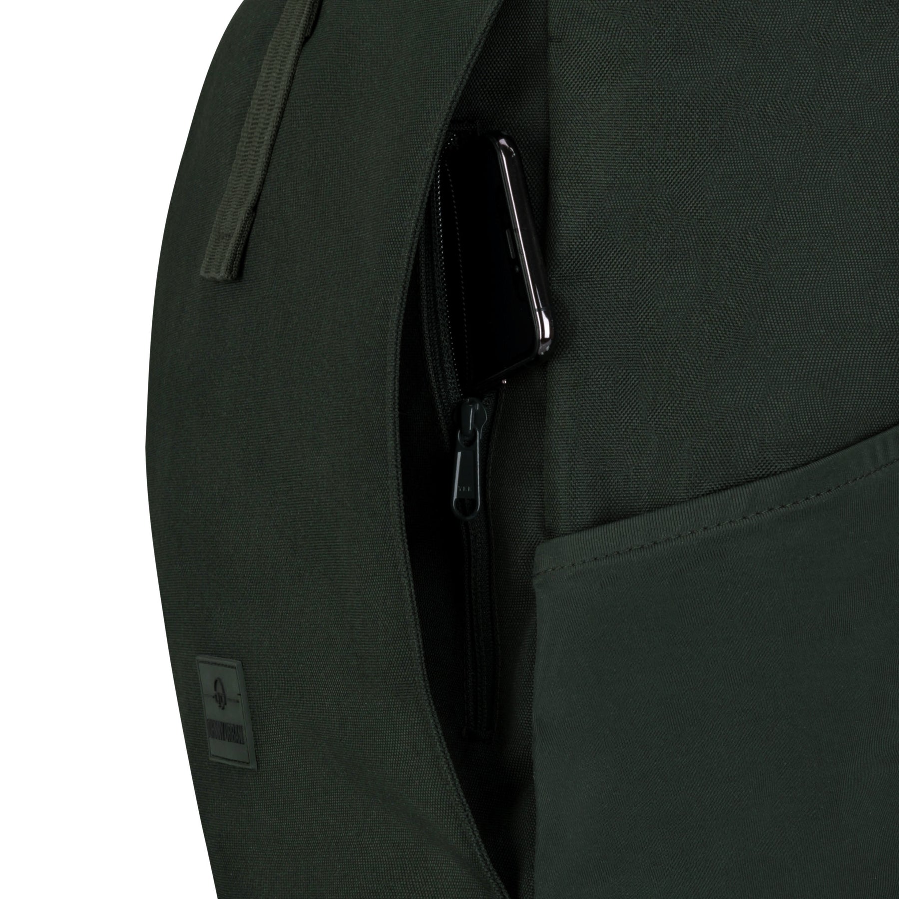 Grüner Johnny Urban Rolltop Rucksack Allen Large mit geöffnetem seitlichem Reißverschlussfach und darin sichtbarem Smartphone