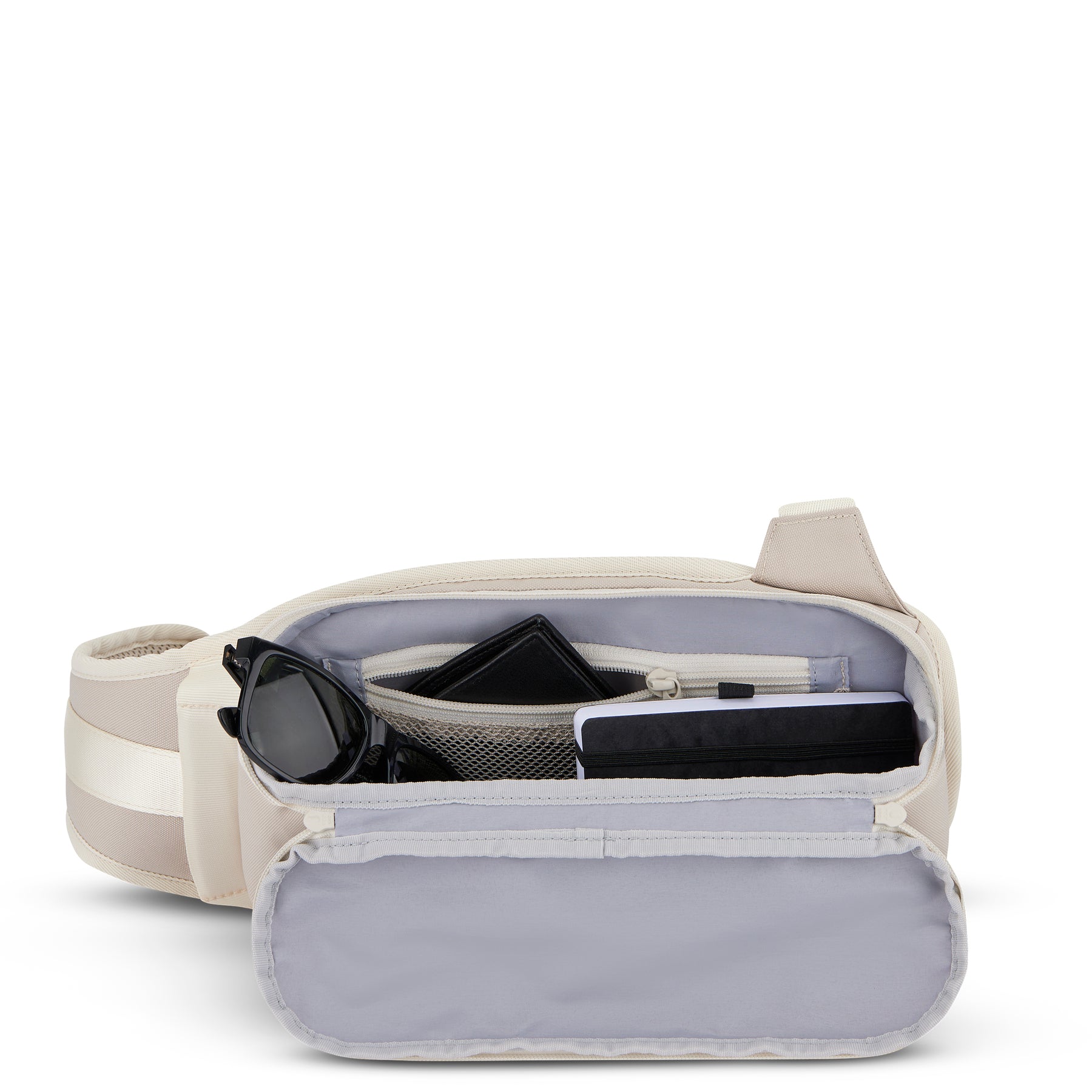 Offene sandfarbene Johnny Urban Sling Bag 'Charlie' mit Sonnenbrille, Geldbörse und Notizbuch
