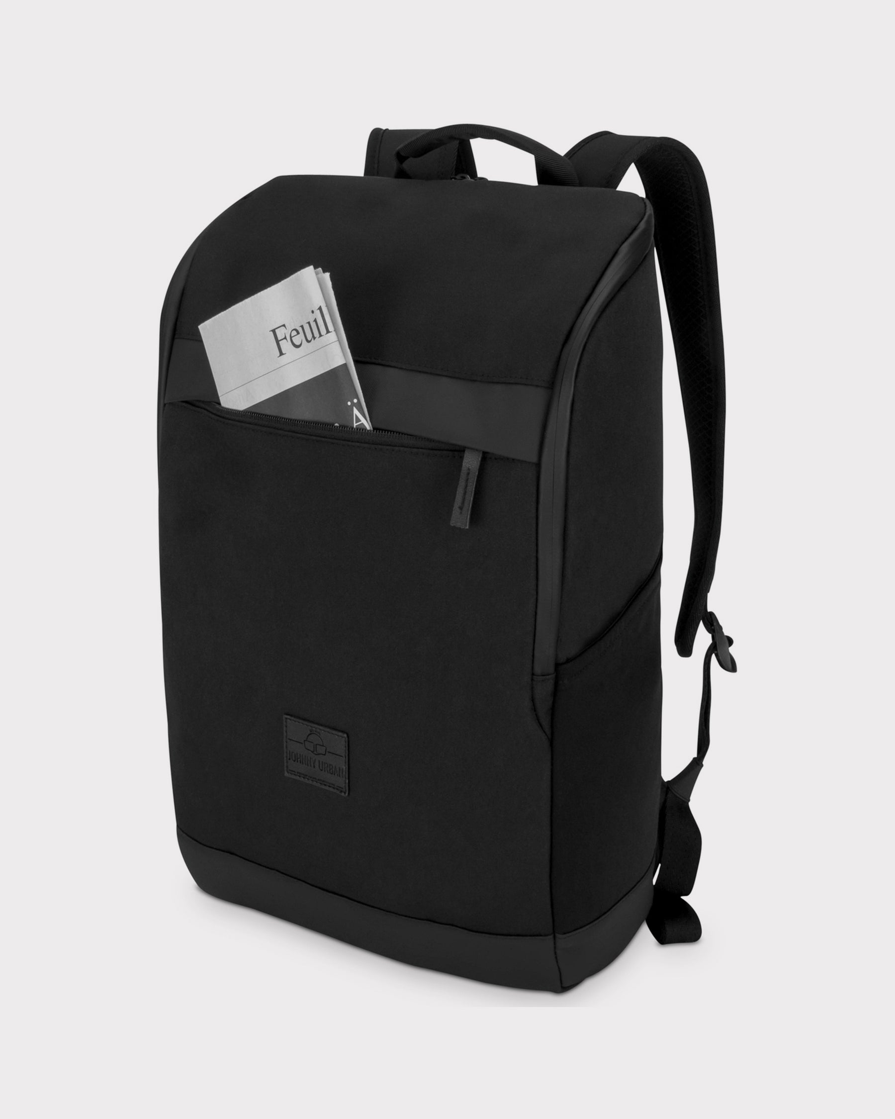 Schwarzer Business-Rucksack Jasper mit Außenfach und Zeitung in der Tasche